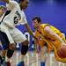 Saline senior Reece Dils attempts to maneuver around Pioneer senior Tevis Robinson Friday, Feb. 1. Daniel Brenner I AnnArbor.com